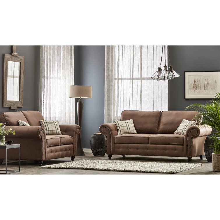 Brown leather store nailhead sofa